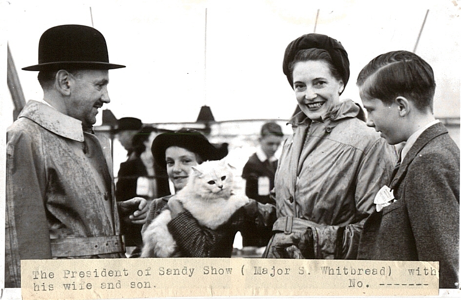 Major Simon Whitbread, President of the Sandy Show with wife, Helen and son Samuel late1940s
